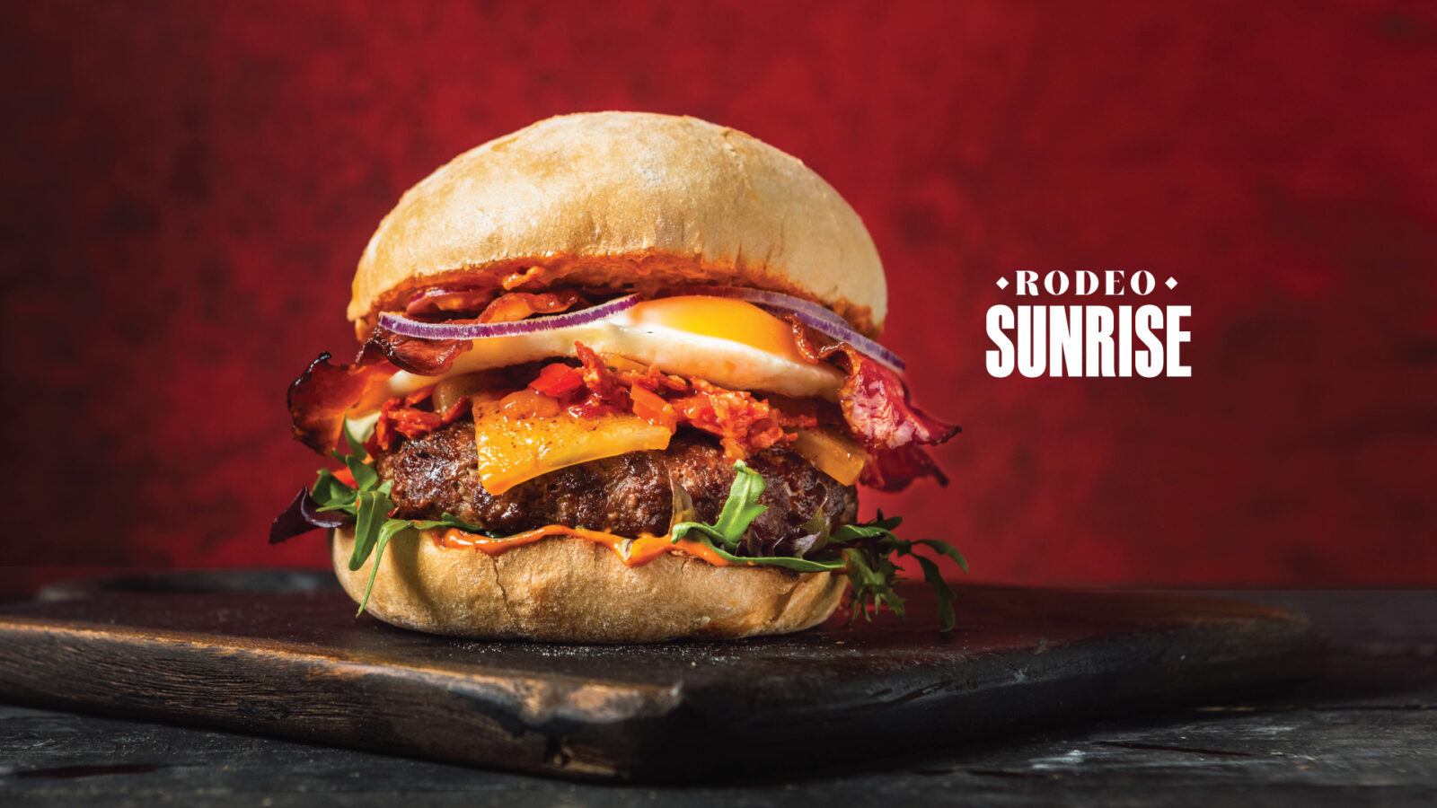 Rodeo Sunset Burger at Ellis Gourmet Burger with logo
